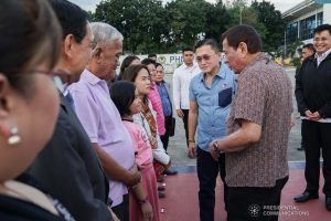 President Rodrigo Roa Duterte meets with the family of Overseas Filipino Worker (OFW) Roderick Aguinaldo, who is currently detained in Bahrain, as the President led their send-off at the Villamor Air Base in Pasay City on January 23, 2020. The family wil leave for Bahrain on Saturday. With the President is Senator Christopher "Bong" Go. KING RODRIGUEZ/PRESIDENTIAL PHOTO
