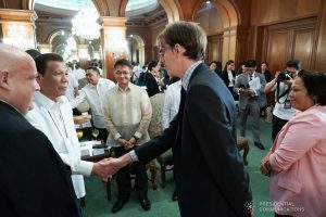 President Rodrigo Roa Duterte greets the members of the delegation of outgoing New Zealand Ambassador to the Philippines David Strachan, who paid a farewell call on the President at the Malacañan Palace on January 27, KING RODRIGUEZ/PRESIDENTIAL PHOTO