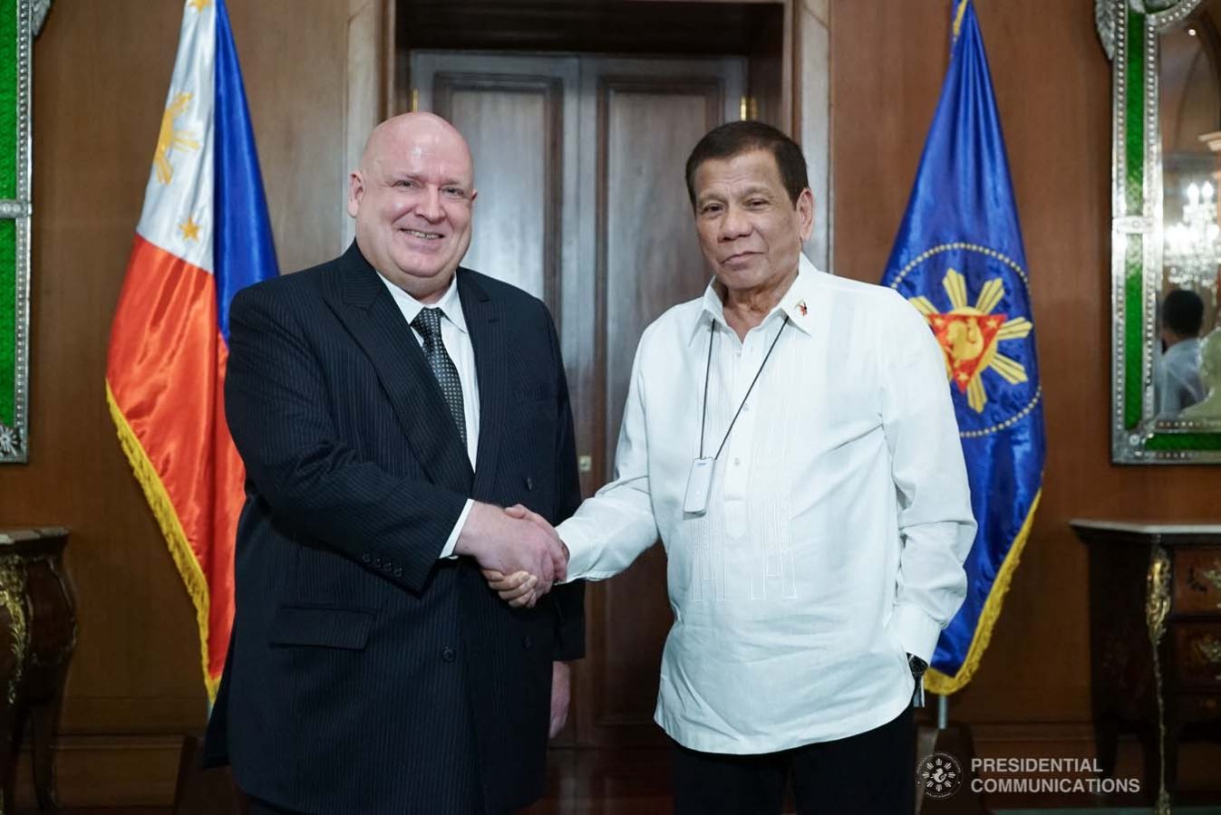 President Rodrigo Roa Duterte poses for posterity with outgoing New Zealand Ambassador to the Philippines David Strachan, who paid a farewell call on the President at the Malacañan Palace on January 27, 2020. KING RODRIGUEZ/PRESIDENTIAL PHOTO