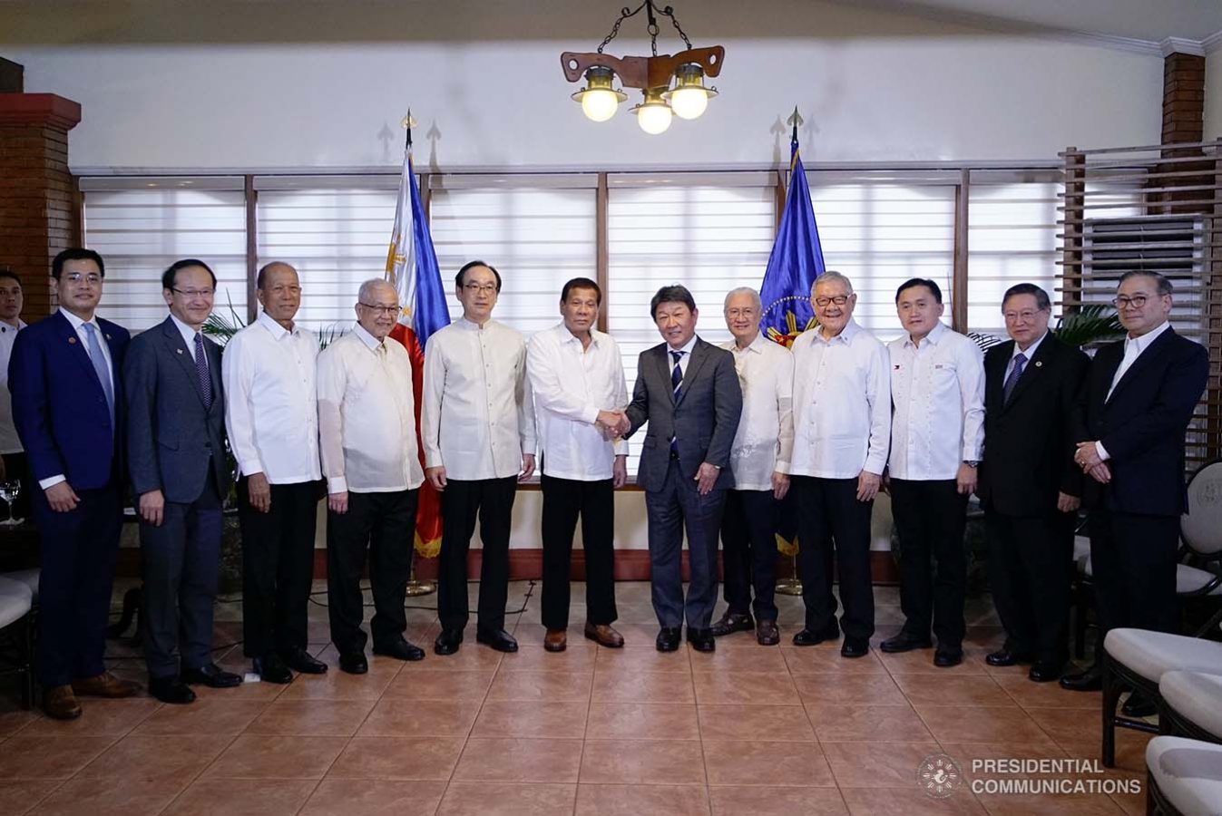 President Rodrigo Roa Duterte poses for posterity with Japanese Foreign Minister Toshimitsu Motegi, who paid a courtesy call on the President at the Malacañang Golf Clubhouse in Manila on January 9, 2020. KING RODRIGUEZ/PRESIDENTIAL PHOTO