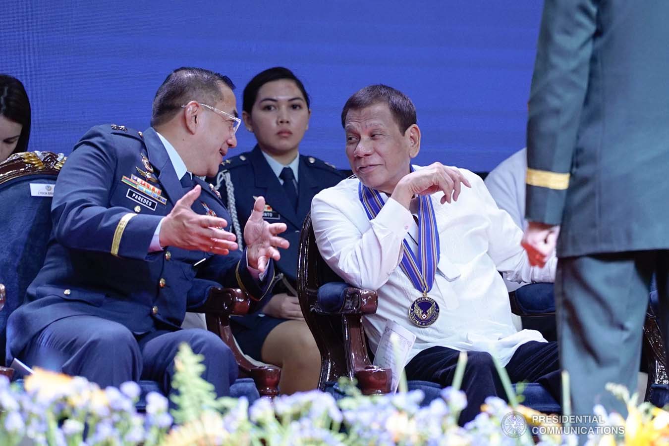President Rodrigo Roa Duterte chats with incoming Philippine Air Force (PAF) Commanding General Major General Allen Paredes during the PAF Change of Command ceremony at the Col. Jesus Villamor Air Base in Pasay City on January 16, 2020. KING RODRIGUEZ/PRESIDENTIAL PHOTO