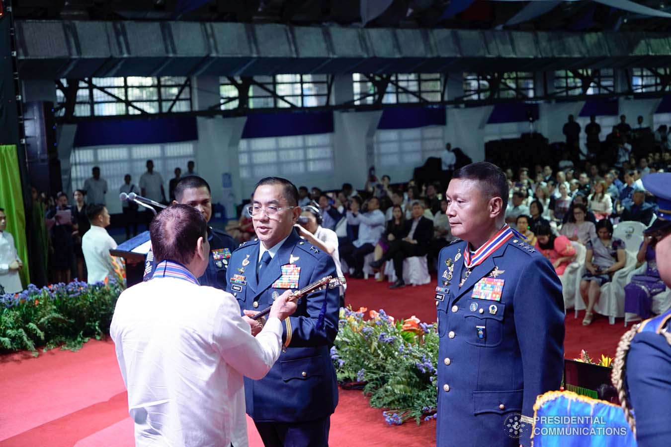President Rodrigo Roa Duterte hands over the command saber to outgoing Philippine Air Force (PAF) Commanding General Lieutenant General Rozzano Briguez during the PAF Change of Command ceremony at the Col. Jesus Villamor Air Base in Pasay City on January 16, 2020. KING RODRIGUEZ/PRESIDENTIAL PHOTO