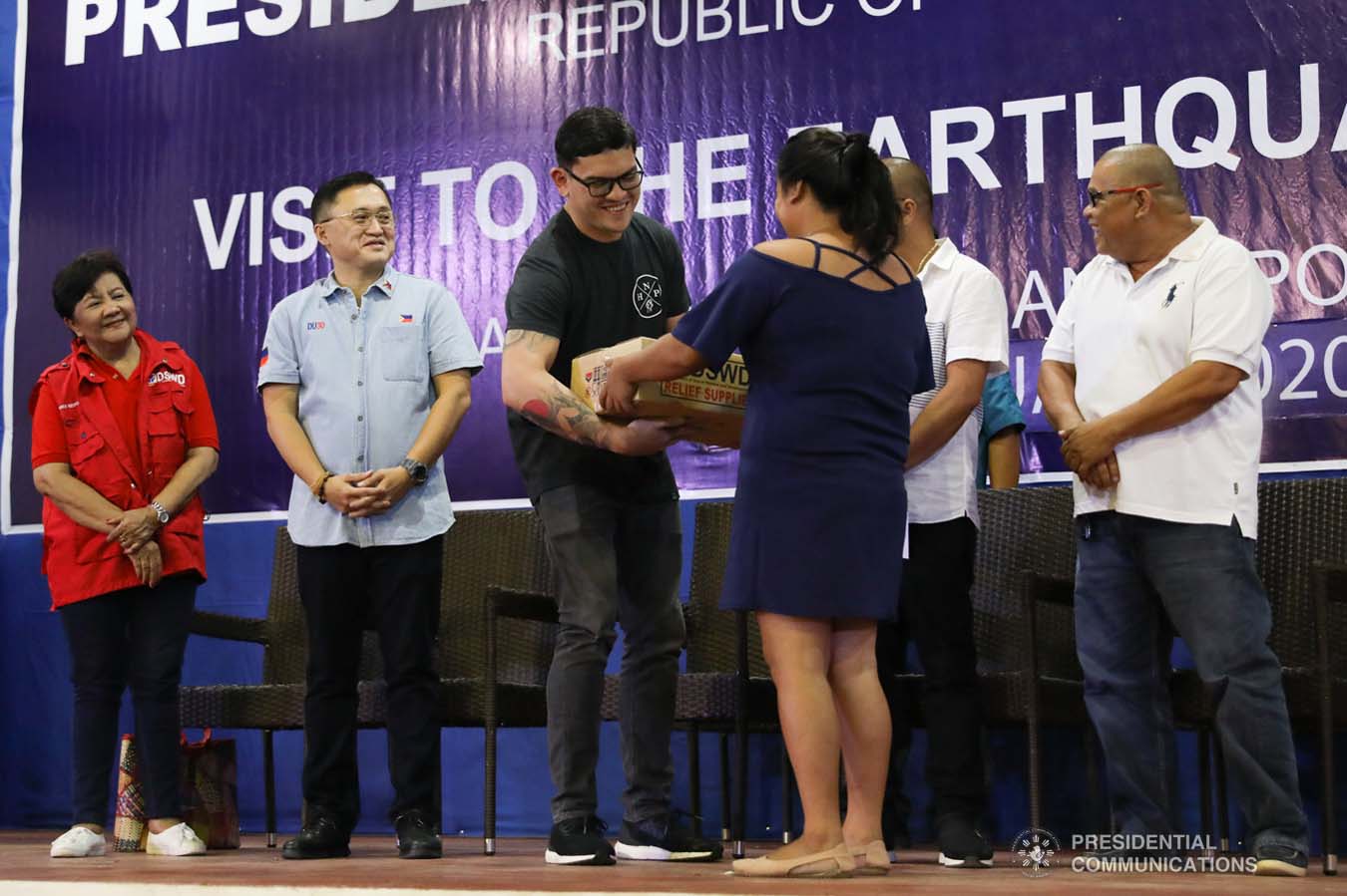 Davao City Vice Mayor Sebastian Duterte, who visited earthquake victims in Malalag, Davao del Sur on behalf of his father President Rodrigo Roa Duterte, leads the ceremonial distribution of family food packs at the Malalag Cultural and Sports Center on January 3, 2020. Assisting the President's son are Social Welfare and Development Undersecretary Luz Ilagan and Senator Christopher "Bong" Go. KARL NORMAN ALONZO/PRESIDENTIAL PHOTO