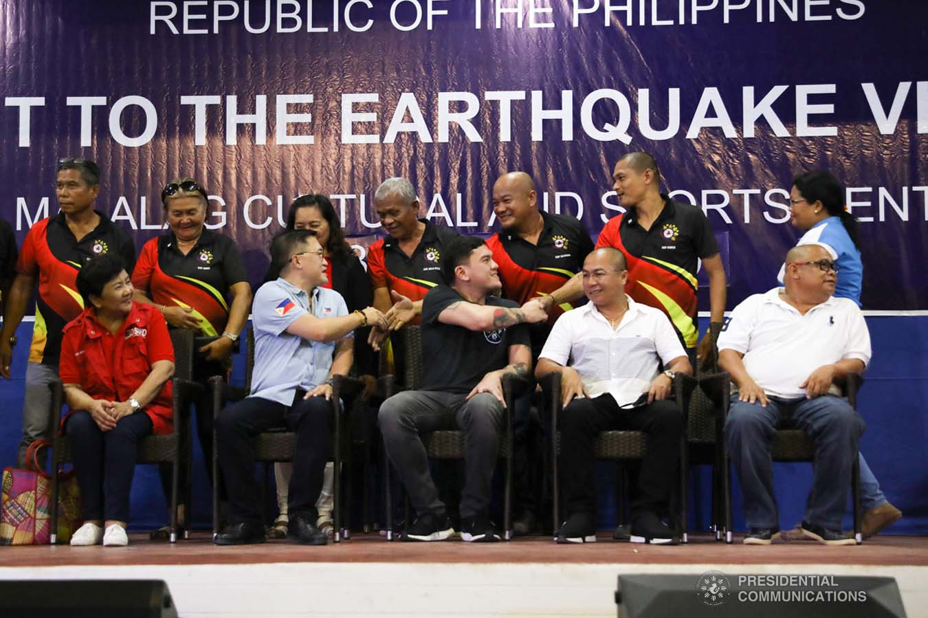 Davao City Vice Mayor Sebastian Duterte, who visited earthquake victims in Malalag, Davao del Sur on behalf of his father President Rodrigo Roa Duterte, greets barangay officials at the Malalag Cultural and Sports Center on January 3, 2020. KARL NORMAN ALONZO/PRESIDENTIAL PHOTO
