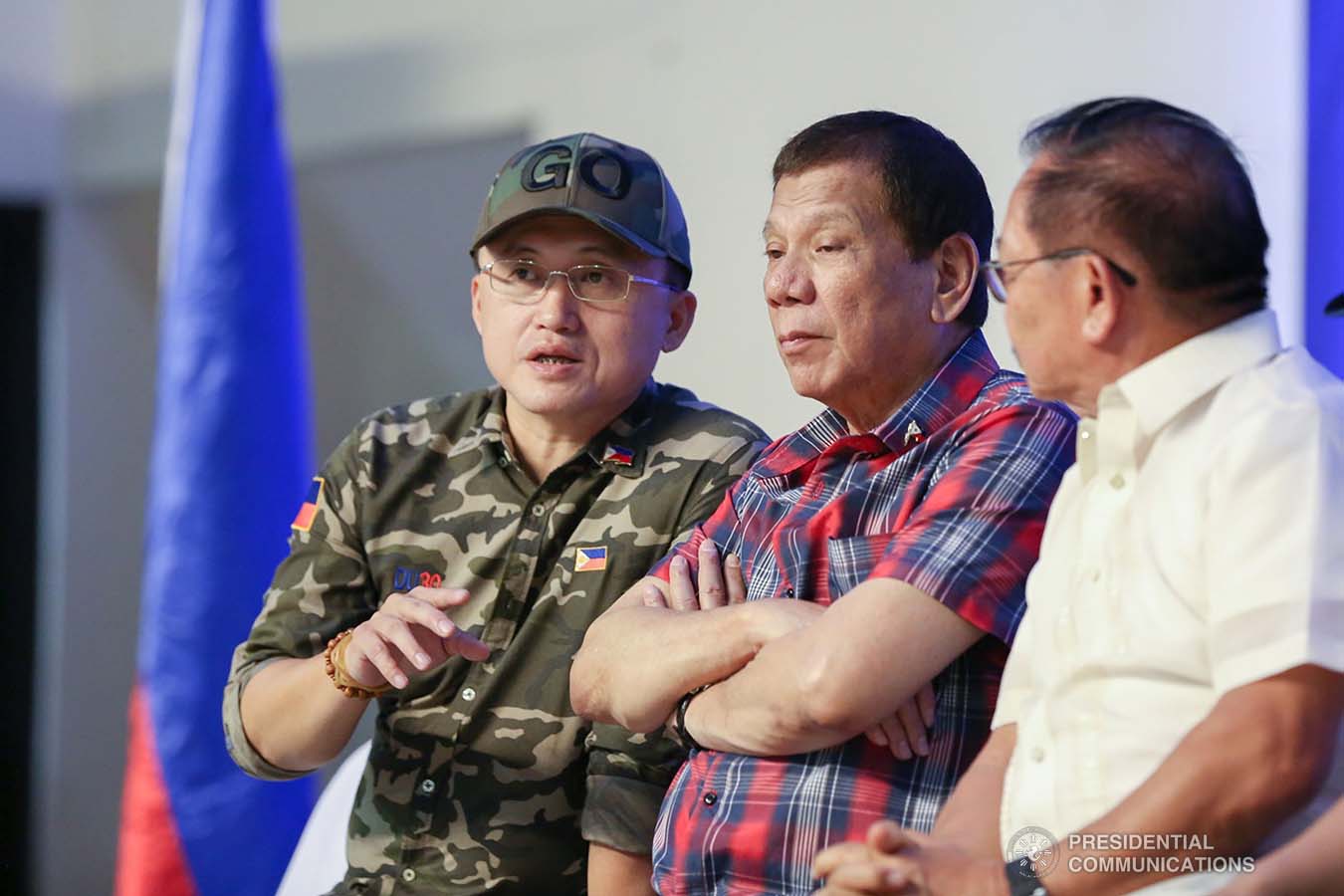 President Rodrigo Roa Duterte chats with Senator Christopher "Bong" Go during the ceremonial distribution of agricultural assistance to the farmers of Region 12 at the Pigcawayan Municipal Gymnasium in Cotabato on January 10, 2020. RICHARD MADELO/PRESIDENTIAL PHOTO