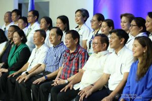 President Rodrigo Roa Duterte poses for posterity with Technical Education and Skills Development Authority (TESDA) Director General Isidro Lapeña, Agriculture Secretary William Dar, Mindanao Development Authority Chair Emmanuel Piñol and some of the local government officials in attendance during the ceremonial distribution of agricultural assistance to the farmers of Region 12 at the Pigcawayan Municipal Gymnasium in Cotabato on January 10, 2020. RICHARD MADELO/PRESIDENTIAL PHOTO