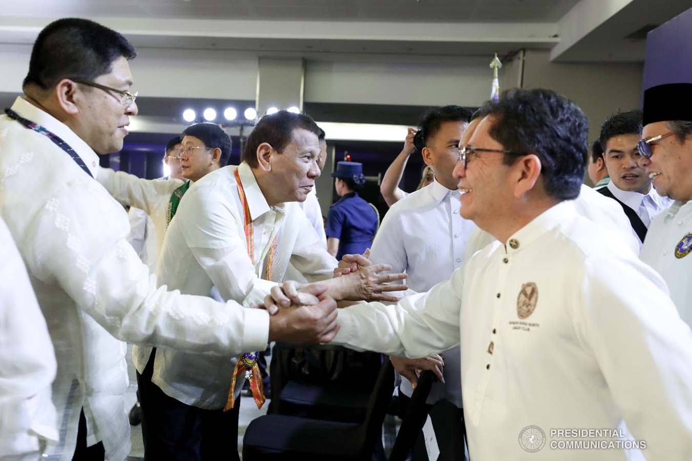 President Rodrigo Roa Duterte greets one of the guests during the thanksgiving gathering with The Fraternal Order of Eagles (TFOE) at the SMX Convention Center in Davao City on January 17, 2020. RICHARD MADELO/PRESIDENTIAL PHOTO