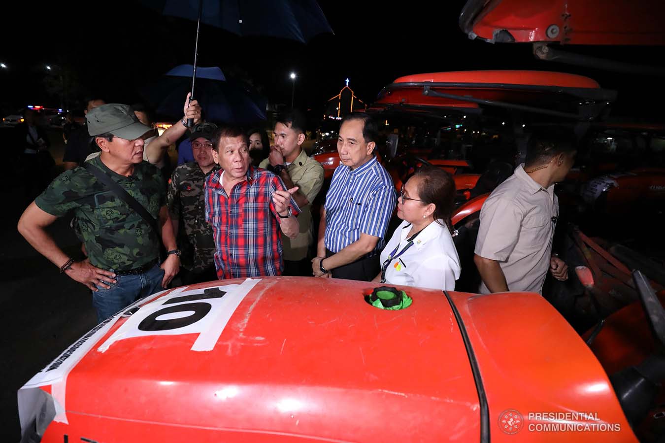 President Rodrigo Roa Duterte inspects the farm machineries during the ceremonial distribution of agricultural assistance to the farmers of Region 12 at the Pigcawayan Municipal Gymnasium in Cotabato on January 10, 2020. With the President are Senator Christopher "Bong" Go and Agriculture Secretary William Dar. RICHARD MADELO/PRESIDENTIAL PHOTO