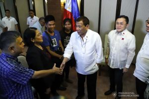 President Rodrigo Roa Duterte greets the officials of the National Kidney Transplant Institute during a meeting at the Malago Clubhouse in Manila on January 15, 2020. With the President is Senator Christopher "Bong" Go. PRESIDENTIAL PHOTO