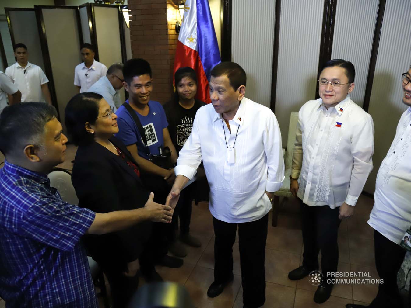 President Rodrigo Roa Duterte greets the officials of the National Kidney Transplant Institute during a meeting at the Malago Clubhouse in Manila on January 15, 2020. With the President is Senator Christopher "Bong" Go. PRESIDENTIAL PHOTO