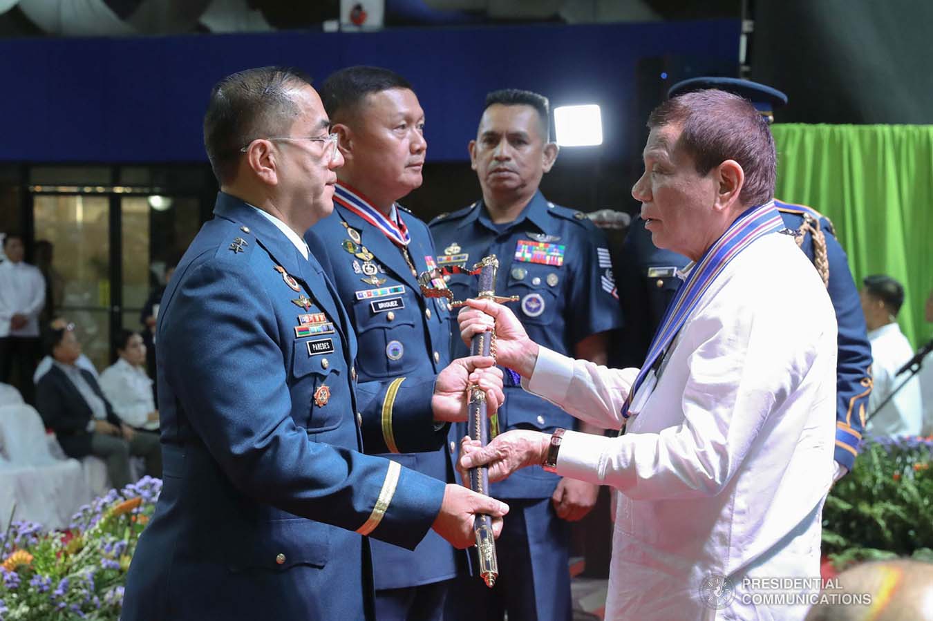 President Rodrigo Roa Duterte hands over the command saber to incoming Philippine Air Force (PAF) Commanding General Major General Allen Paredes during the PAF Change of Command ceremony at the Col. Jesus Villamor Air Base in Pasay City on January 16, 2020. REY BANIQUET/PRESIDENTIAL PHOTO 