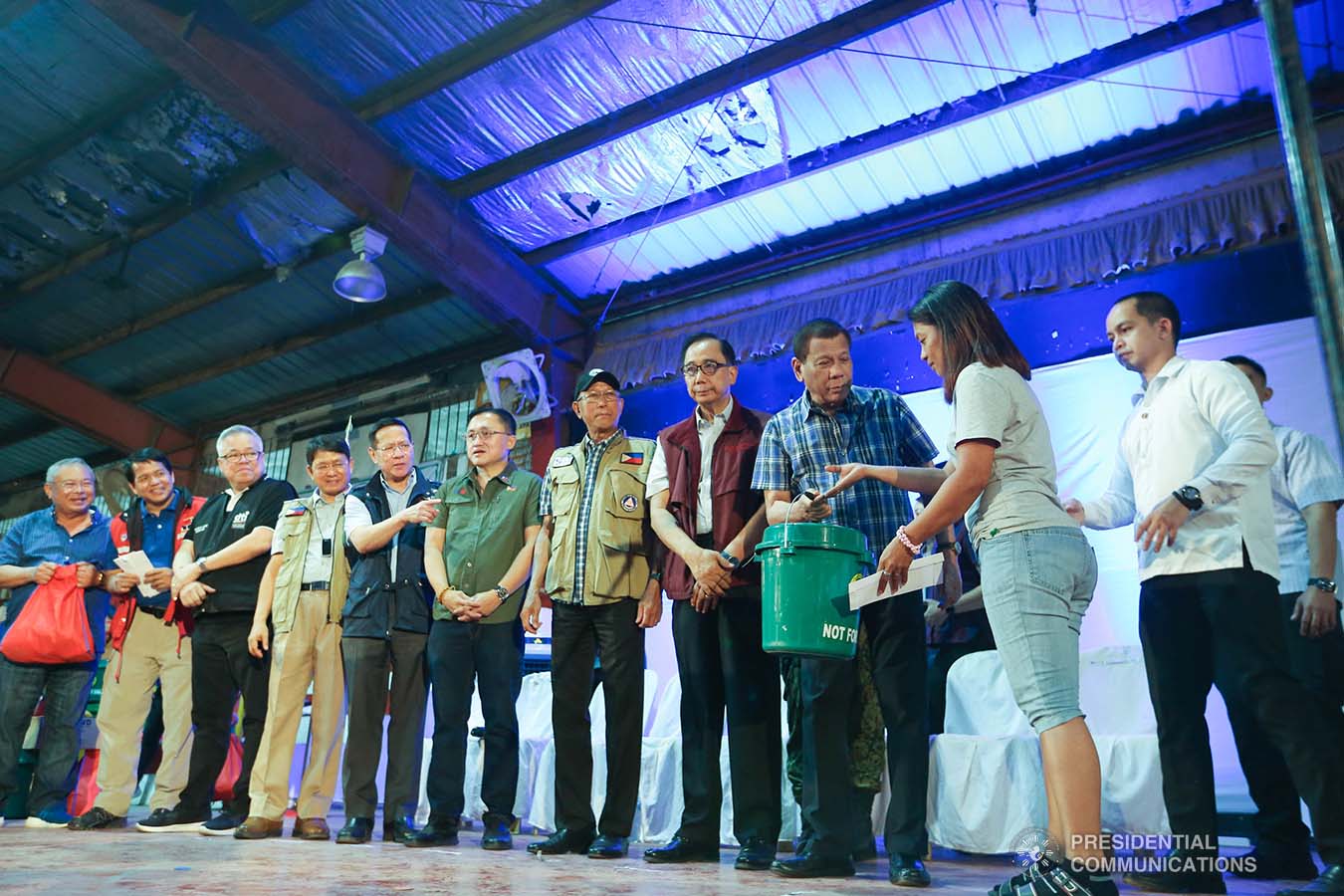 President Rodrigo Roa Duterte leads the ceremonial distribution of calamity assistance to the families affected by the Taal Volcano eruption at the Polytechnic University of the Philippines-Sto. Tomas Campus in Sto. Tomas City, Batangas on January 20, 2020. VALERIE ESCALERA/PRESIDENTIAL PHOTO