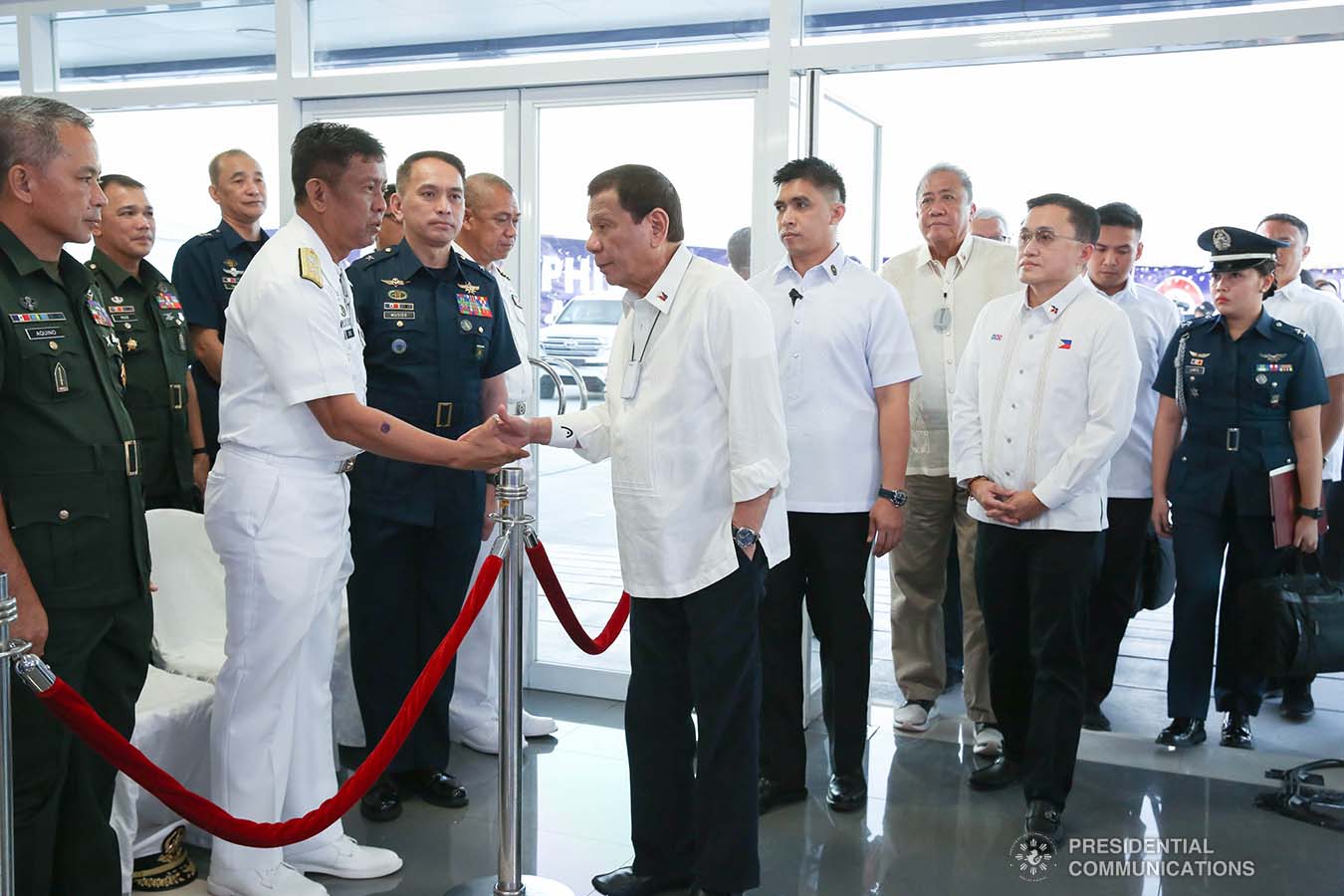President Rodrigo Roa Duterte greets a Philippine Navy official upon his arrival at the Sangley Airport in Cavite City for its inauguration on February 15, 2020. ALBERT ALCAIN/PRESIDENTIAL PHOTO