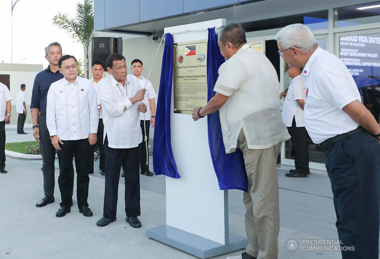 President Rodrigo Roa Duterte leads the unveiling of the marker of the Sangley Airport Development Project in Cavite City during its inauguration on February 15, 2020. Assisting the President is Transportation Secretary Arthur Tugade. ALFRED FRIAS/PRESIDENTIAL PHOTO
