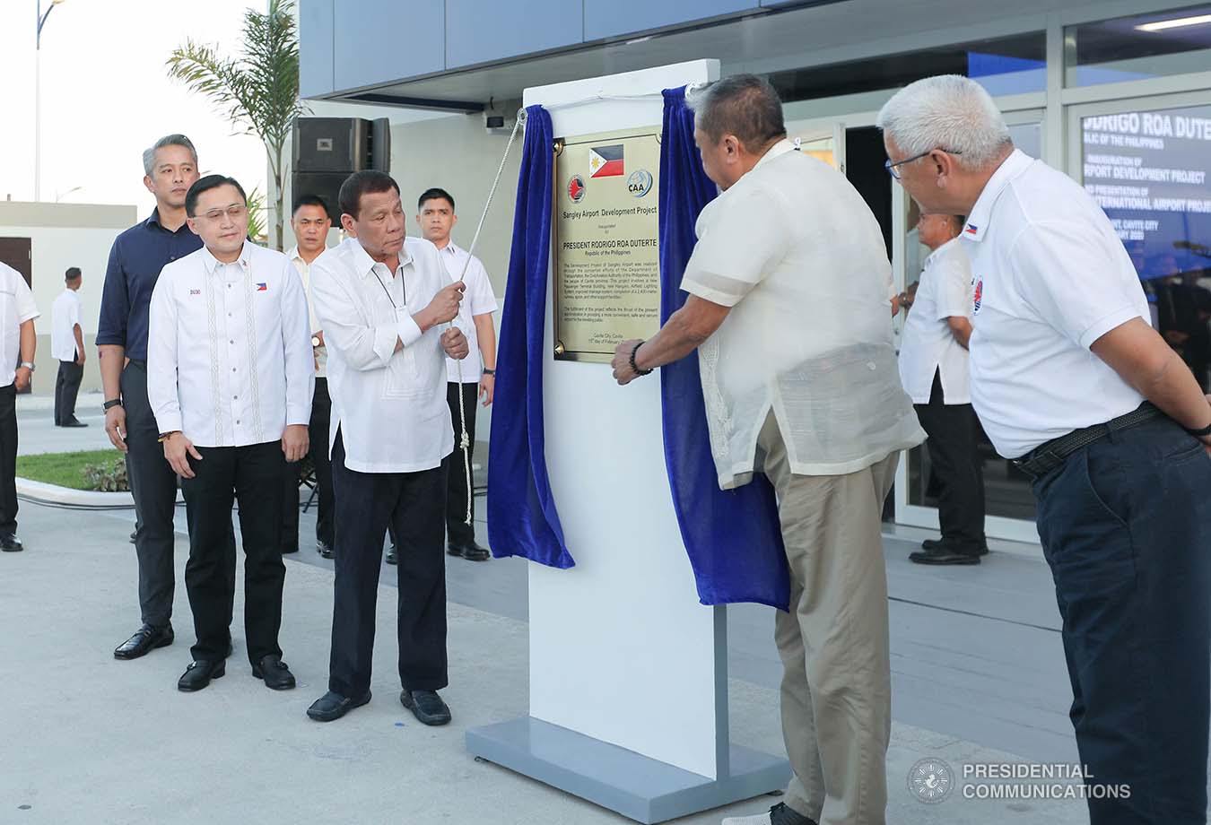 President Rodrigo Roa Duterte leads the unveiling of the marker of the Sangley Airport Development Project in Cavite City during its inauguration on February 15, 2020. Assisting the President is Transportation Secretary Arthur Tugade. ALFRED FRIAS/PRESIDENTIAL PHOTO