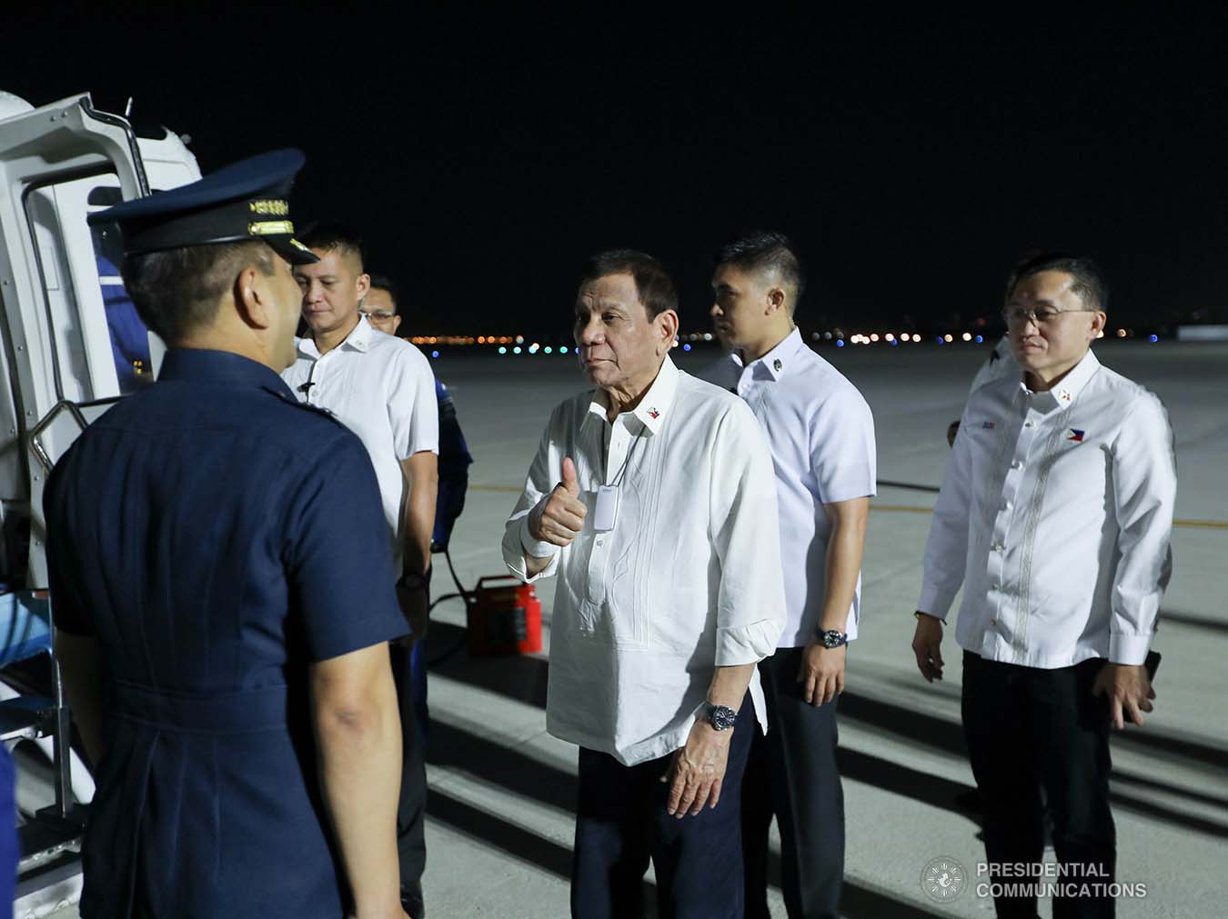 AF35 President Rodrigo Roa Duterte gives a thumbs up to a police official after gracing the inauguration of the Sangley Airport Development Project in Cavite City on February 15, 2020. ALFRED FRIAS/PRESIDENTIAL PHOTO