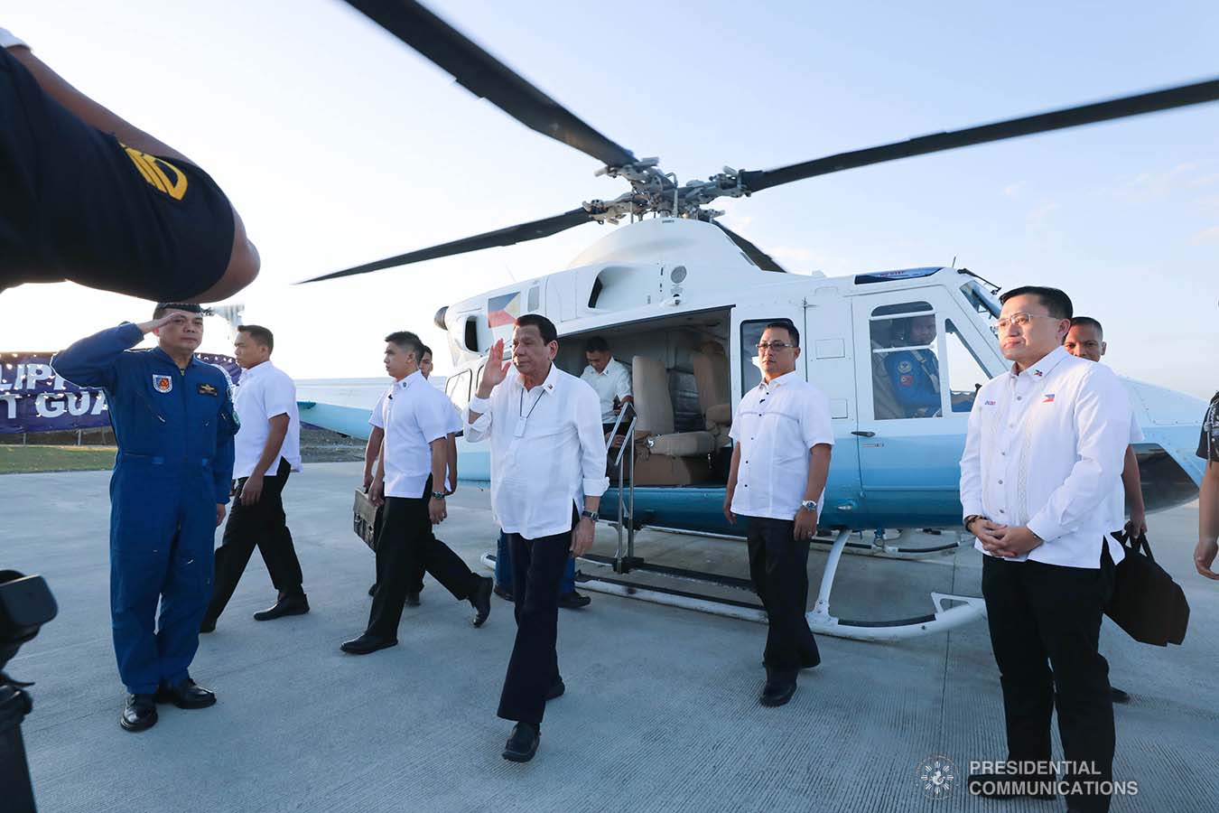 President Rodrigo Roa Duterte salutes a police official upon his arrival at the Sangley Airport in Cavite City for its inauguration on February 15, 2020. ROBINSON NIÑAL JR./PRESIDENTIAL PHOTO