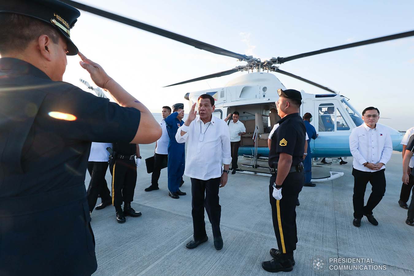 President Rodrigo Roa Duterte salutes a police official upon his arrival at the Sangley Airport in Cavite City for its inauguration on February 15, 2020. ROBINSON NIÑAL JR./PRESIDENTIAL PHOTO