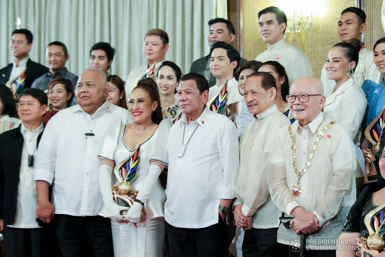 President Rodrigo Roa Duterte poses for posterity with the recipients of the12th Ani ng Dangal Awards at the Malacañan Palace on February 26, 2020. ROBINSON NIÑAL JR./PRESIDENTIAL PHOTO