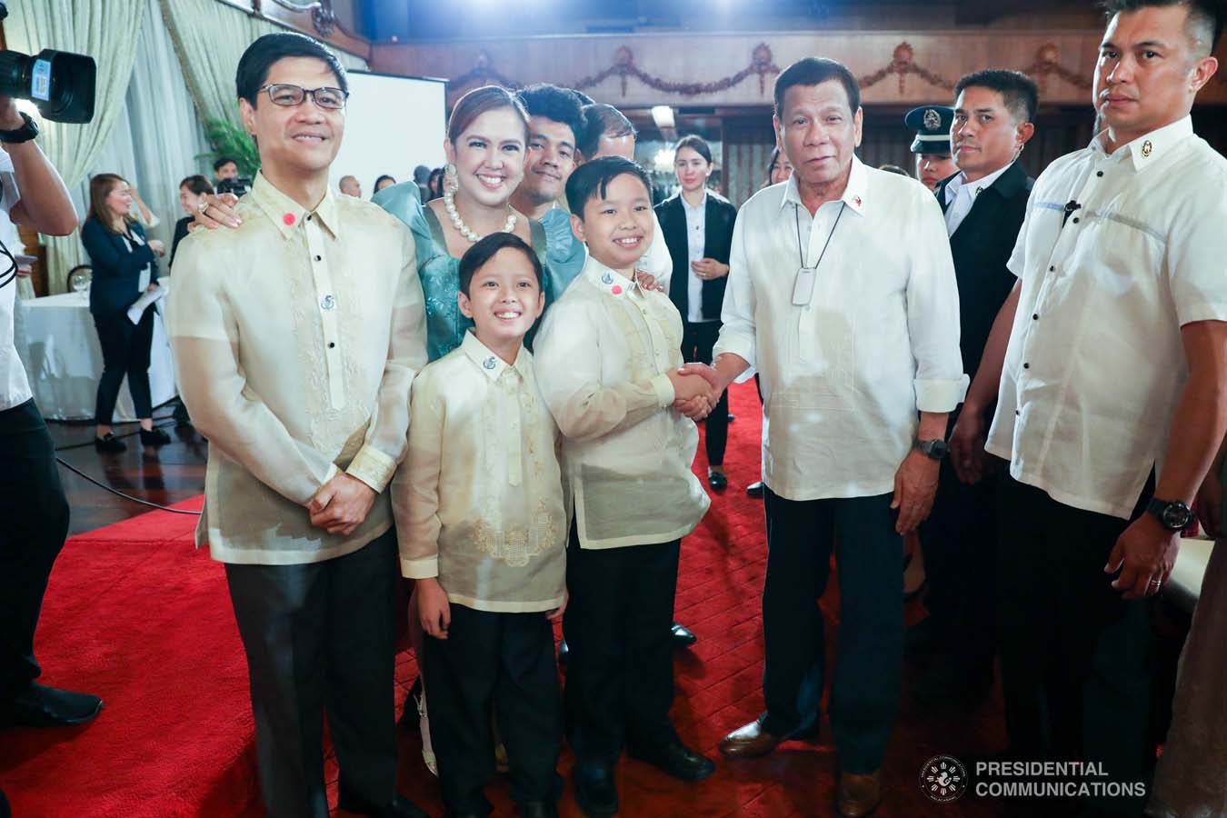 President Rodrigo Roa Duterte poses for posterity with one of the 12th Ani ng Dangal awardees during the presentation of awards at the Malacañan Palace on February 26, 2020. SIMEON CELI JR./PRESIDENTIAL PHOTO