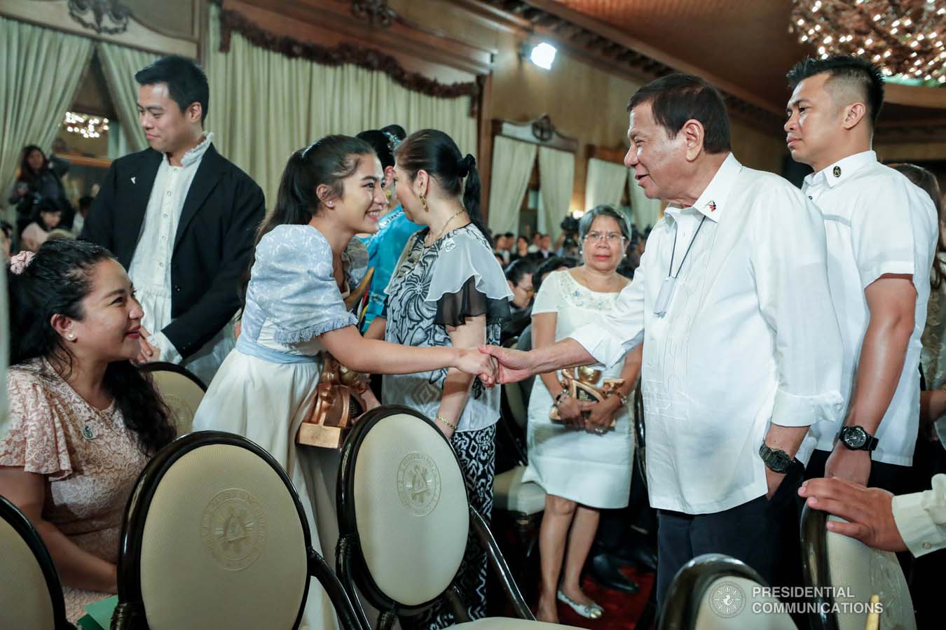 President Rodrigo Roa Duterte greets one of the 12th Ani ng Dangal awardees during the presentation of awards at the Malacañan Palace on February 26, 2020. RICHARD MADELO/PRESIDENTIAL PHOTO