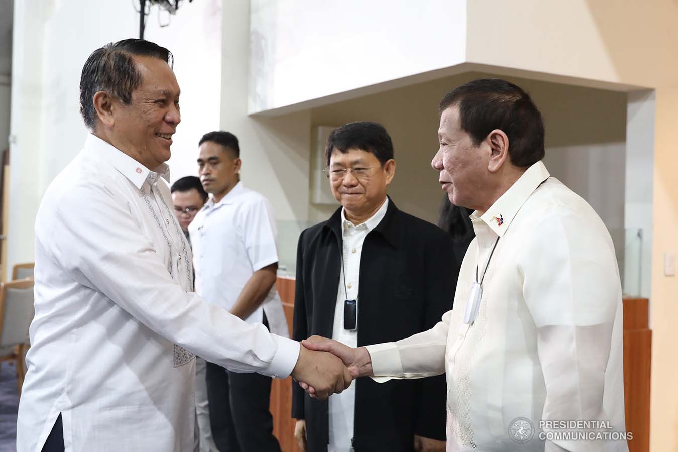 President Rodrigo Roa Duterte greets Philippine Public Safety College President Ricardo De Leon upon his arrival at the Arcadia Active Lifestyle Center in Davao City for the joint graduation ceremony of the Public Safety Officers Basic Course (PSOBC) Class 2019-07 and the Public Safety Officers Advance Course (PSOAC) Class 2019-18 on February 20, 2020. TOTO LOZANO/PRESIDENTIAL PHOTO