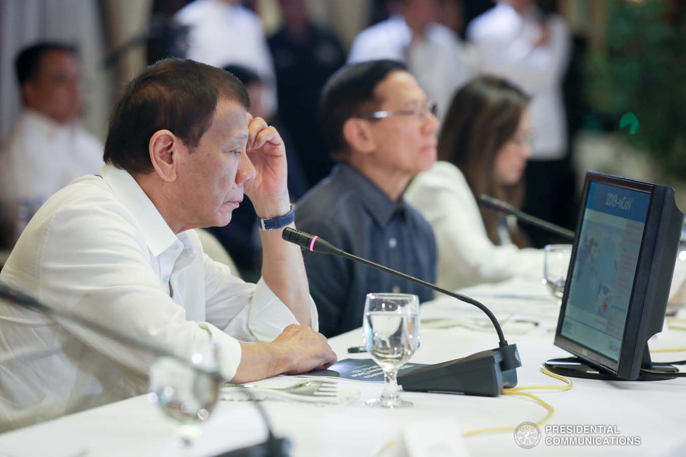 President Rodrigo Roa Duterte reads a report on the 2019 novel Coronavirus (2019-nCoV) during a briefing at the Malacañan Palace on February 3, 2020. TOTO LOZANO/PRESIDENTIAL PHOTO
