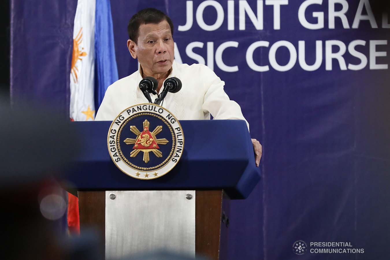 President Rodrigo Roa Duterte delivers a speech during the joint graduation ceremony of Public Safety Officers Basic Course Class 2019-07 and Advance Course (PSOAC) Class 2019-18 at the Arcadia Active Lifestyle Center in Davao City on February 20, 2020. TOTO LOZANO/PRESIDENTIAL PHOTO