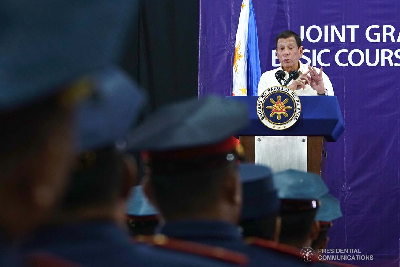President Rodrigo Roa Duterte delivers a speech during the joint graduation ceremony of the Public Safety Officers Basic Course (PSOBC) Class 2019-07 and the Public Safety Officers Advance Course (PSOAC) Class 2019-18 at the Arcadia Active Lifestyle Center in Davao City on February 20, 2020. JOEY DALUMPINES/PRESIDENTIAL PHOTO