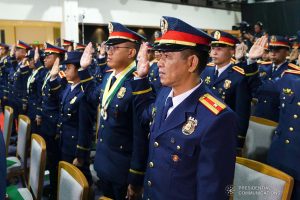 Graduates of the Public Safety Officers Basic Course Class 2019-07 and Advance Course Class 2019-18 recite the alumni pledge during their graduation ceremony at the Arcadia Active Lifestyle Center in Davao City on February 20, 2020. JOEY DALUMPINES/PRESIDENTIAL PHOTO