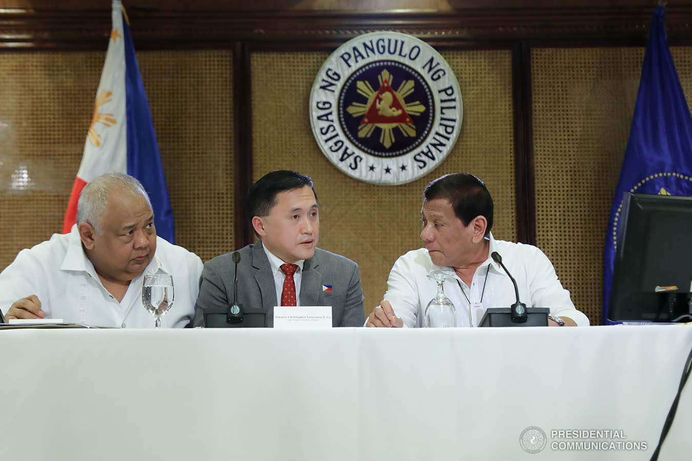 President Rodrigo Roa Duterte confers with Executive Secretary Salvador Medialdea and Senator Christopher "Bong" Go during a meeting with the Inter-Agency Task Force for the Management of Emerging Infectious Diseases at the Malacañan Palace on March 9, 2020.