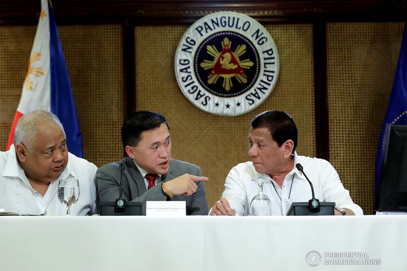President Rodrigo Roa Duterte confers with Executive Secretary Salvador Medialdea and Senator Christopher "Bong" Go during a meeting with the Inter-Agency Task Force for the Management of Emerging Infectious Diseases at the Malacañan Palace on March 9, 2020.