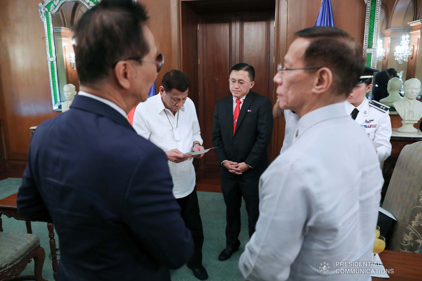 President Rodrigo Roa Duterte skims through a document before meeting with Ambassador of the People's Republic of China to the Philippines Huang Xilian who paid a courtesy call on the President at the Malacañan Palace on March 11, 2020. ROBINSON NIÑAL JR./PRESIDENTIAL PHOTO