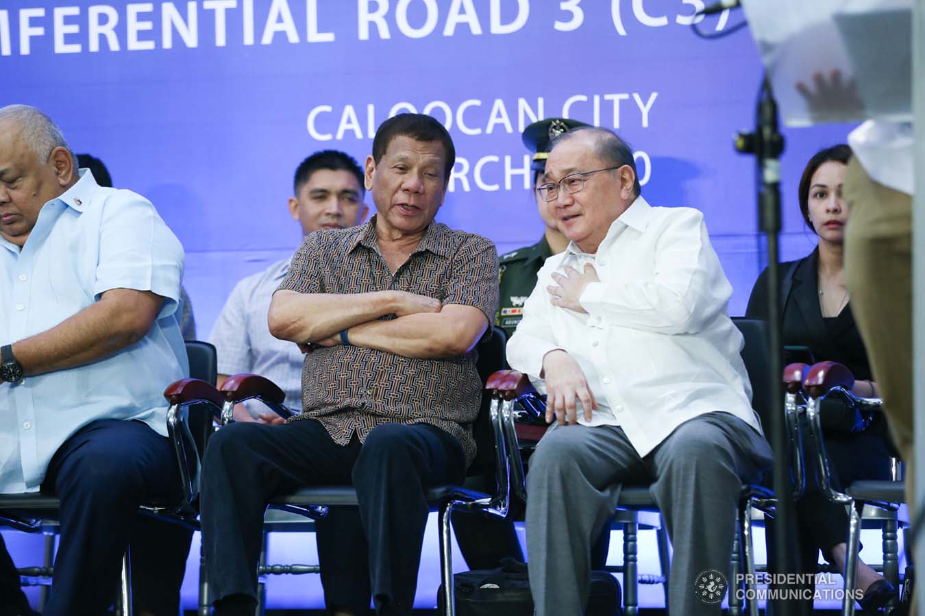 President Rodrigo Roa Duterte chats with Metro Pacific Investments Corporation Chairman Manuel Pangilinan after leading the inspection of the North Luzon Expressway (NLEX) Harbor Link Circumferential Road 3 (C3)-R10 Section in Caloocan City on March 5, 2020. SIMEON CELI JR./PRESIDENTIAL PHOTO