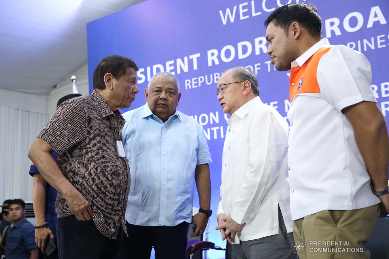 President Rodrigo Roa Duterte discusses matters with Executive Secretary Salvador Medialdea, Metro Pacific Investments Corporation Chairman Manuel Pangilinan and Public Works and Highways Secretary Mark Villar after leading the inspection of the North Luzon Expressway (NLEX) Harbor Link Circumferential Road 3 (C3)-R10 Section in Caloocan City on March 5, 2020. SIMEON CELI JR./PRESIDENTIAL PHOTO