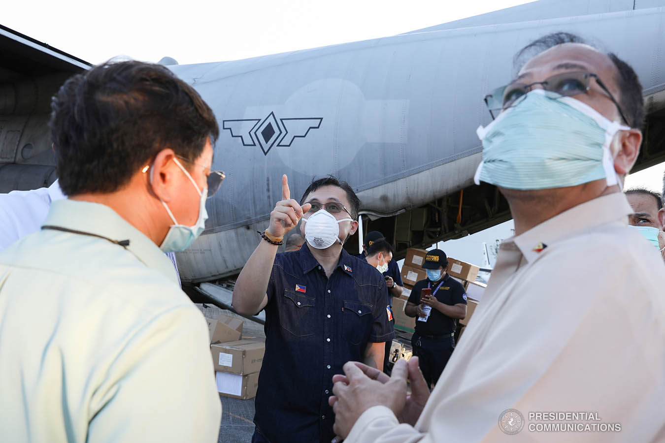Interior and Local Government Secretary Eduardo Año, Defense Secretary Delfin Lorenzana, Presidential Adviser Carlito Galvez Jr. check the thousands of aid packages donated by the People's Republic of China to help the Philippines combat coronavirus at the Villamor Air Base in Pasay City on March 21, 2020. The donation includes assorted medical supplies, personal protective equipment, and testing kits for coronavirus. Also present was former special assistant to President Duterte and now Senate Committee on Health chairperson Senator Christopher Lawrence "Bong" Go. TOTO LOZANO/PRESIDENTIAL PHOTO