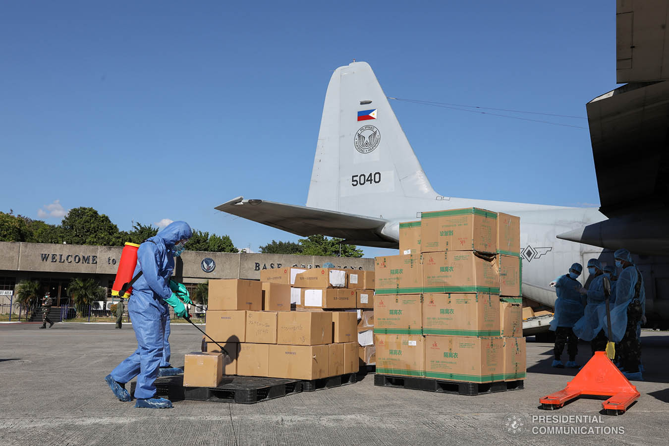 The aid packages donated by the People's Republic of China undergo disinfection upon arrival at the Villamor Air Base in Pasay City on March 21, 2020. The donation includes assorted medical supplies, personal protective equipment, and testing kits for coronavirus. TOTO LOZANO/PRESIDENTIAL PHOTO