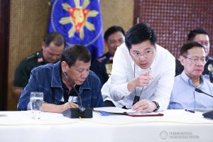 President Rodrigo Roa Duterte confers with Cabinet Secretary Karlo Nograles during the meeting with the Inter-Agency Task Force on the Emerging Infectious Diseases (IATF-EID) at the Malacañan Palace on March 12, 2020. RICHARD MADELO/PRESIDENTIAL PHOTO