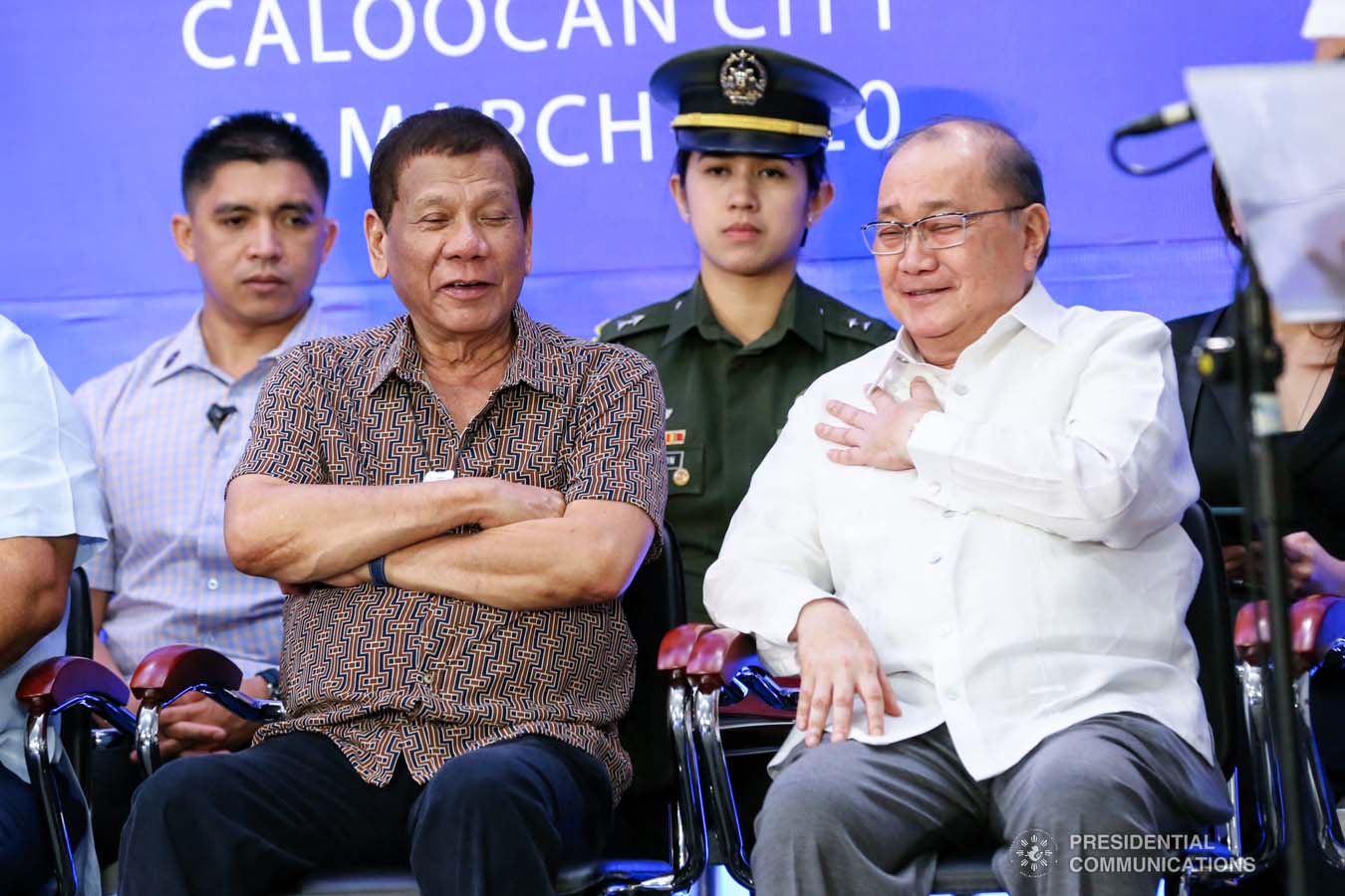 President Rodrigo Roa Duterte shares a light moment with Metro Pacific Investments Corporation Chairman Manuel Pangilinan after leading the inspection of the North Luzon Expressway (NLEX) Harbor Link Circumferential Road 3 (C3)-R10 Section in Caloocan City on March 5, 2020. RICHARD MADELO/PRESIDENTIAL PHOTO