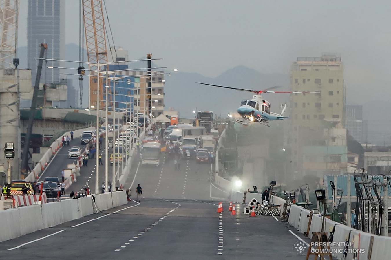 The chopper carrying President Rodrigo Roa Duterte hovers over the North Luzon Expressway (NLEX) Harbor Link Circumferential Road 3 (C3)-R10 Section as he leads the inspection in Caloocan City on March 5, 2020. VALERIE ESCALERA/PRESIDENTIAL PHOTO