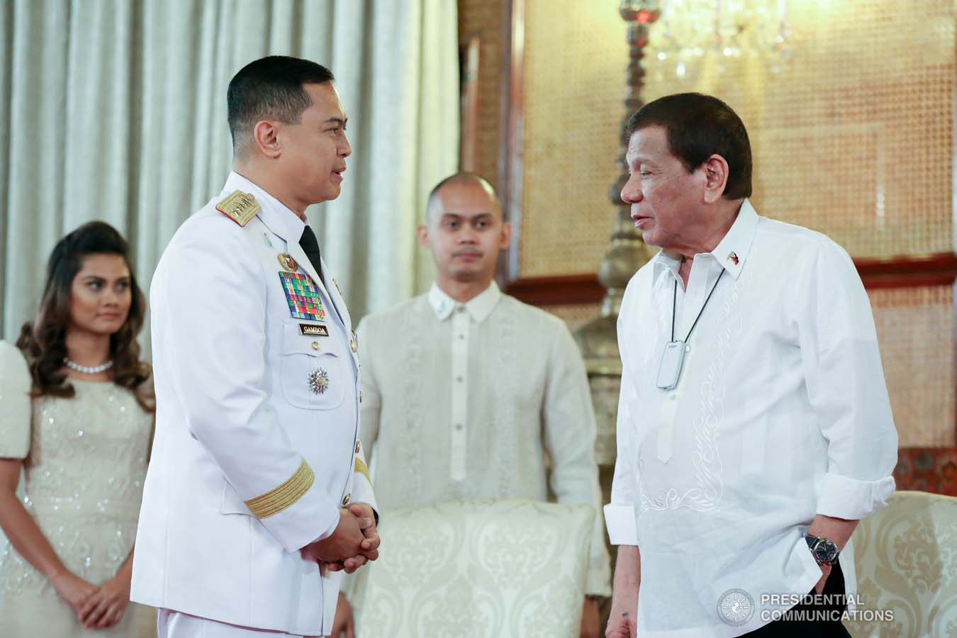 President Rodrigo Roa Duterte chats with Philippine National Police (PNP) chief General Archie Gamboa during the oath-taking ceremony of the newly appointed Generals and Flag Officers of the Armed Forces of the Philippines and Star Rank Officers of the PNP at the Malacañan Palace on March 11, 2020. ALBERT ALCAIN/PRESIDENTIAL PHOTO