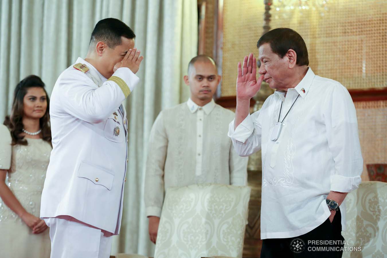 President Rodrigo Roa Duterte salutes Philippine National Police (PNP) chief  General Archie Gamboa during the oath-taking ceremony of the newly appointed Generals and Flag Officers of the Armed Forces of the Philippines and Star Rank Officers of the PNP at the Malacañan Palace on March 11, 2020. ALBERT ALCAIN/PRESIDENTIAL PHOTO
