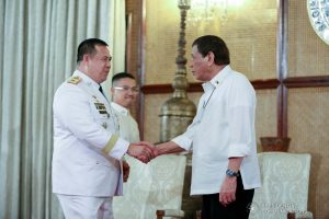 President Rodrigo Roa Duterte congratulates one of the newly appointed Star Rank Officers of the Philippine National Police during the oath-taking ceremony at the Malacañan Palace on March 11, 2020. ALBERT ALCAIN/PRESIDENTIAL PHOTO