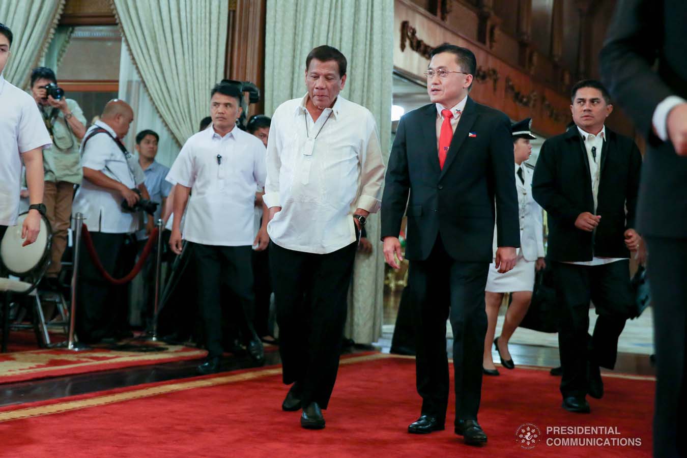 President Rodrigo Roa Duterte is accompanied by Senator Christopher "Bong" Go upon his arrival at the Malacañan Palace for the oath-taking ceremony of the newly appointed Generals and Flag Officers of the Armed Forces of the Philippines and Star Rank Officers of the Philippine National Police on March 11, 2020. ALBERT ALCAIN/PRESIDENTIAL PHOTO