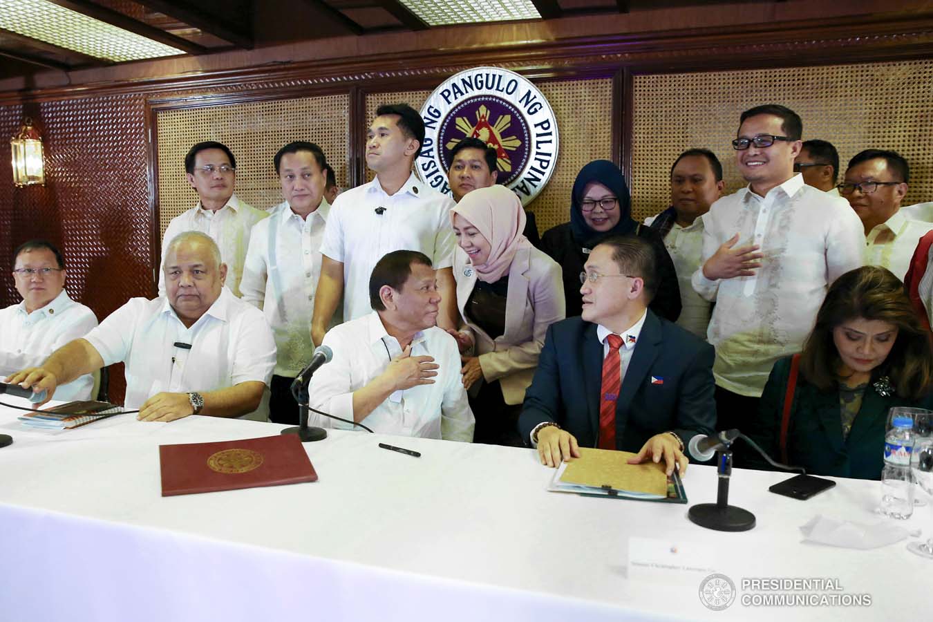 President Rodrigo Roa Duterte shares a light moment with one of the guests during the meeting at the Malacañan Palace on March 4, 2020. ALFRED FRIAS/PRESIDENTIAL PHOTO