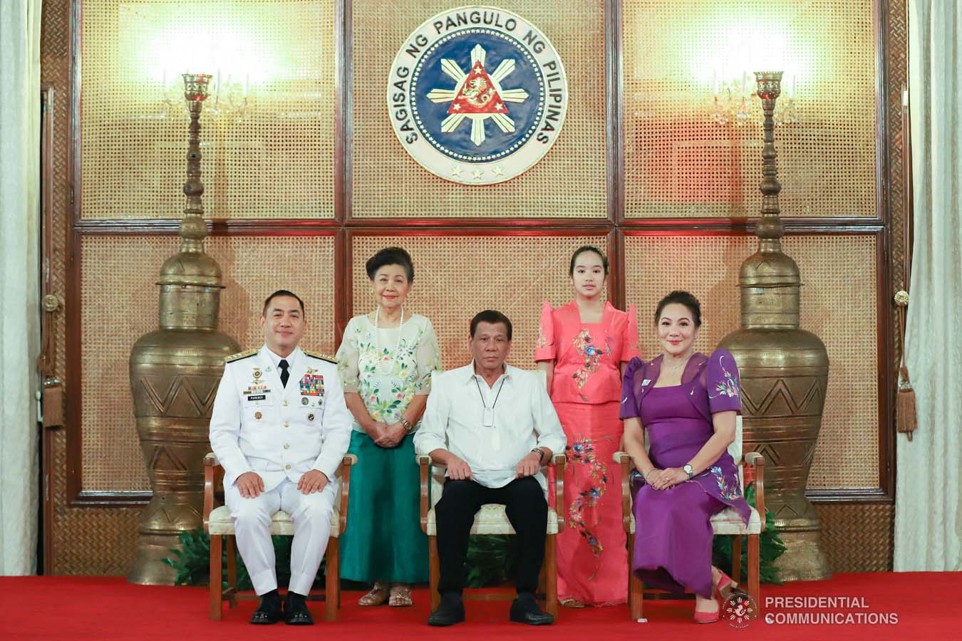 President Rodrigo Roa Duterte poses for posterity with Philippine Air Force chief Lieutenant General Allen Paredes and his family during the oath-taking ceremony of the newly appointed Generals and Flag Officers of the Armed Forces of the Philippines and Star Rank Officers of the Philippine National Police at the Malacañan Palace on March 11, 2020. REY BANIQUET/PRESIDENTIAL PHOTO