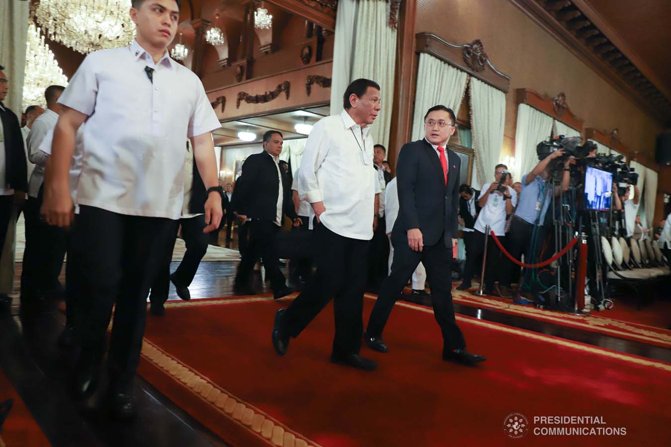 President Rodrigo Roa Duterte is accompanied by Senator Christopher "Bong" Go upon his arrival at the Malacañan Palace for the oath-taking ceremony of the newly appointed Generals and Flag Officers of the Armed Forces of the Philippines and Star Rank Officers of the Philippine National Police on March 11, 2020. REY BANIQUET/PRESIDENTIAL PHOTO