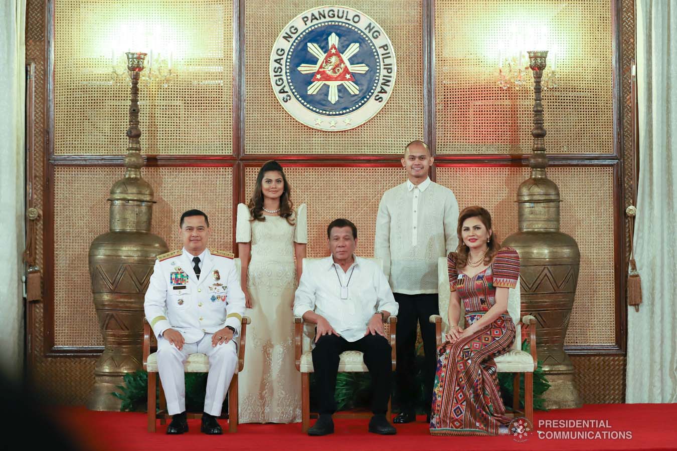 President Rodrigo Roa Duterte poses for posterity with Philippine National Police (PNP) chief  General Archie Gamboa and his family during the oath-taking ceremony of the newly appointed Generals and Flag Officers of the Armed Forces of the Philippines and Star Rank Officers of the PNP at the Malacañan Palace on March 11, 2020. REY BANIQUET/PRESIDENTIAL PHOTO
