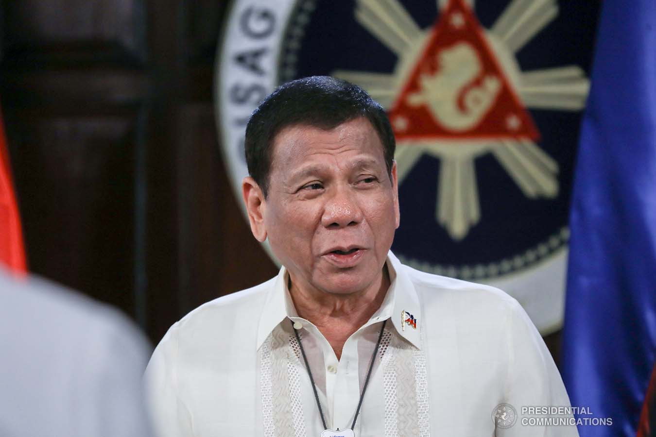 President Rodrigo Roa Duterte talks to some members of the Cabinet after joining other leaders from the Association of Southeast Asian Nations (ASEAN) member countries during the special ASEAN Summit on Covid-19 video conference at the Malago Clubhouse in Malacañang on April 14, 2020. TOTO LOZANO/PRESIDENTIAL PHOTOS