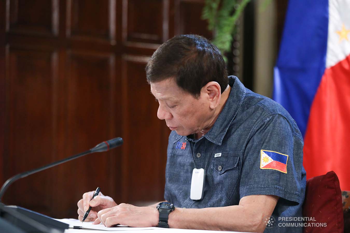 President Rodrigo Roa Duterte reviews a document while holding a meeting with members of the Inter-Agency Task Force on the Emerging Infectious Diseases (IATF-EID) at the Malago Clubhouse in Malacañang on May 11, 2020. ACE MORANDANTE/PRESIDENTIAL PHOTO